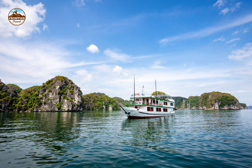 Ha Long Bay and Cat Ba Archipelago with limestone karst islands rising from emerald waters